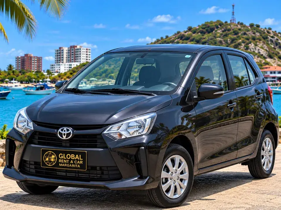 Toyota Agya de la flota frente al malecón, Isla de Margarita [V]